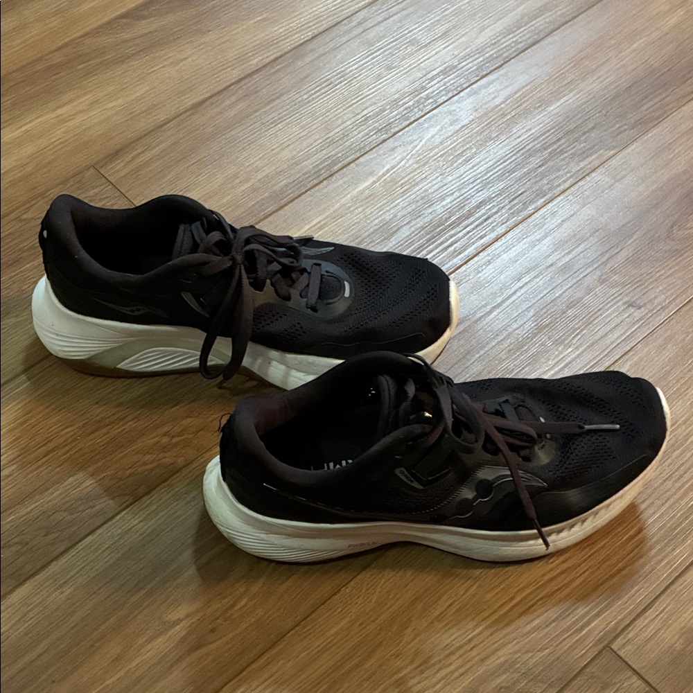 Saucony Black Athletic Shoes with White Soles